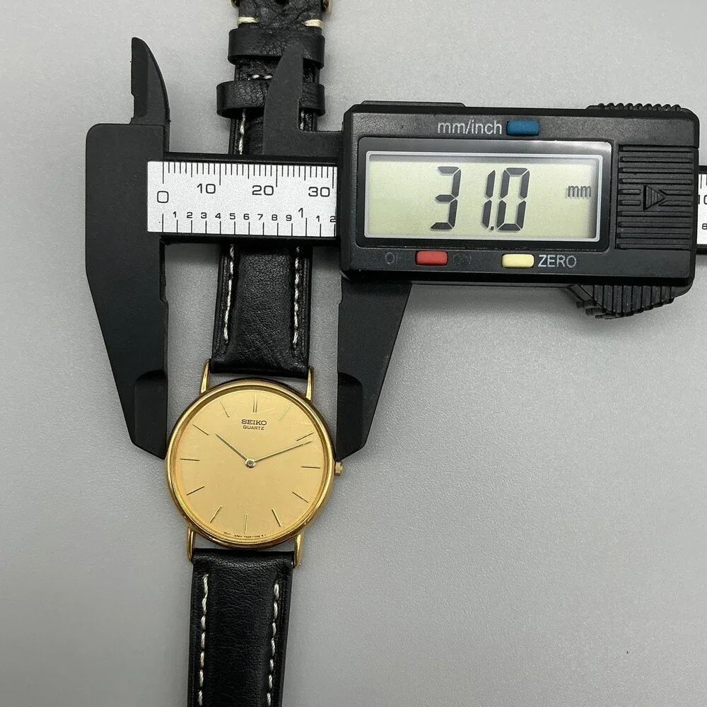 Vintage Seiko Mens Watch 31mm Gold Tone Black Leather 7N00-7A49 New Battery